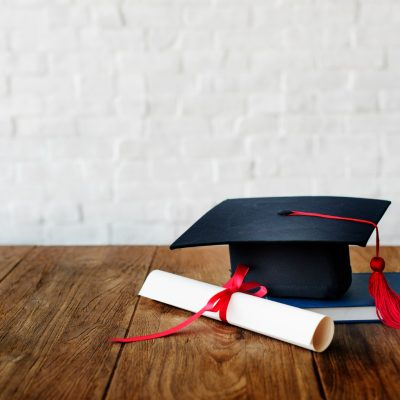 mortar-board-and-graduation-diploma